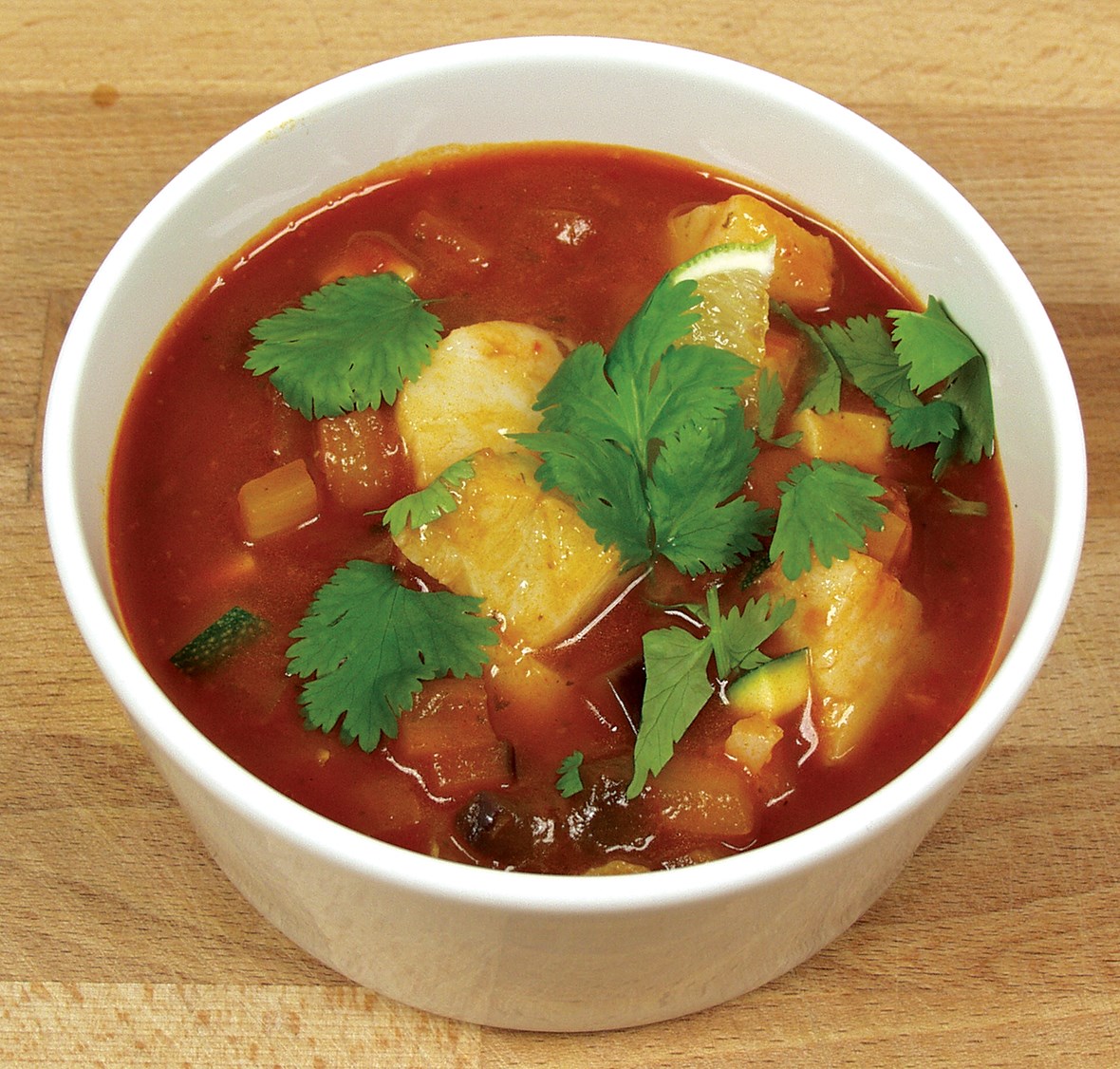 Spicy tomatisert fiskesuppe